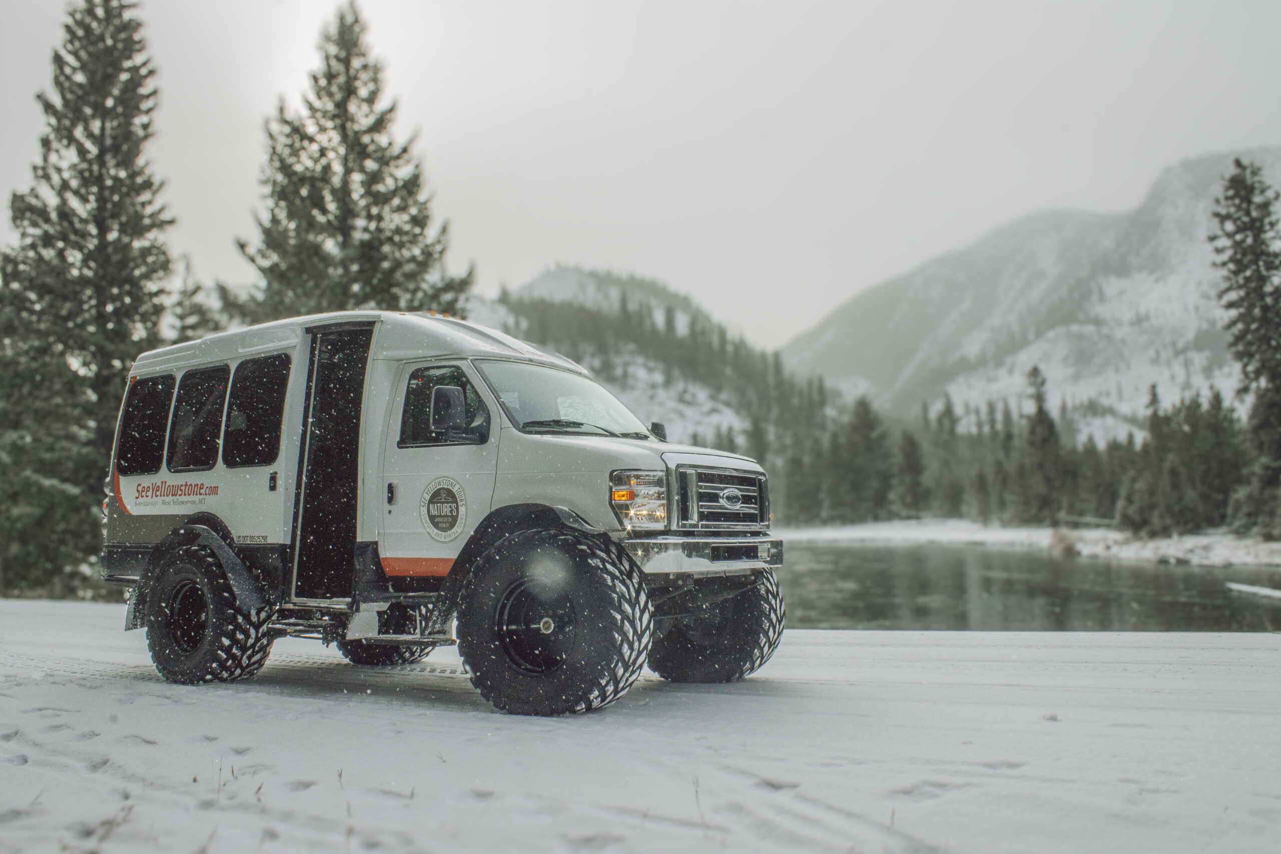 Snowcoach exploring Yellowstone National Park in winter